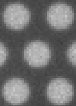 Figure 3: Comparison of Small Particle Note that the pattern imaged is the same circle pattern from Figure 1 but magnified. 