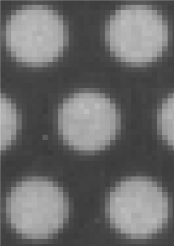 Figure 3: Comparison of Small Particle (Left) and Large Particle (Right) Scintillator Images. Note that the pattern imaged is the same circle pattern from Figure 1 but magnified. 