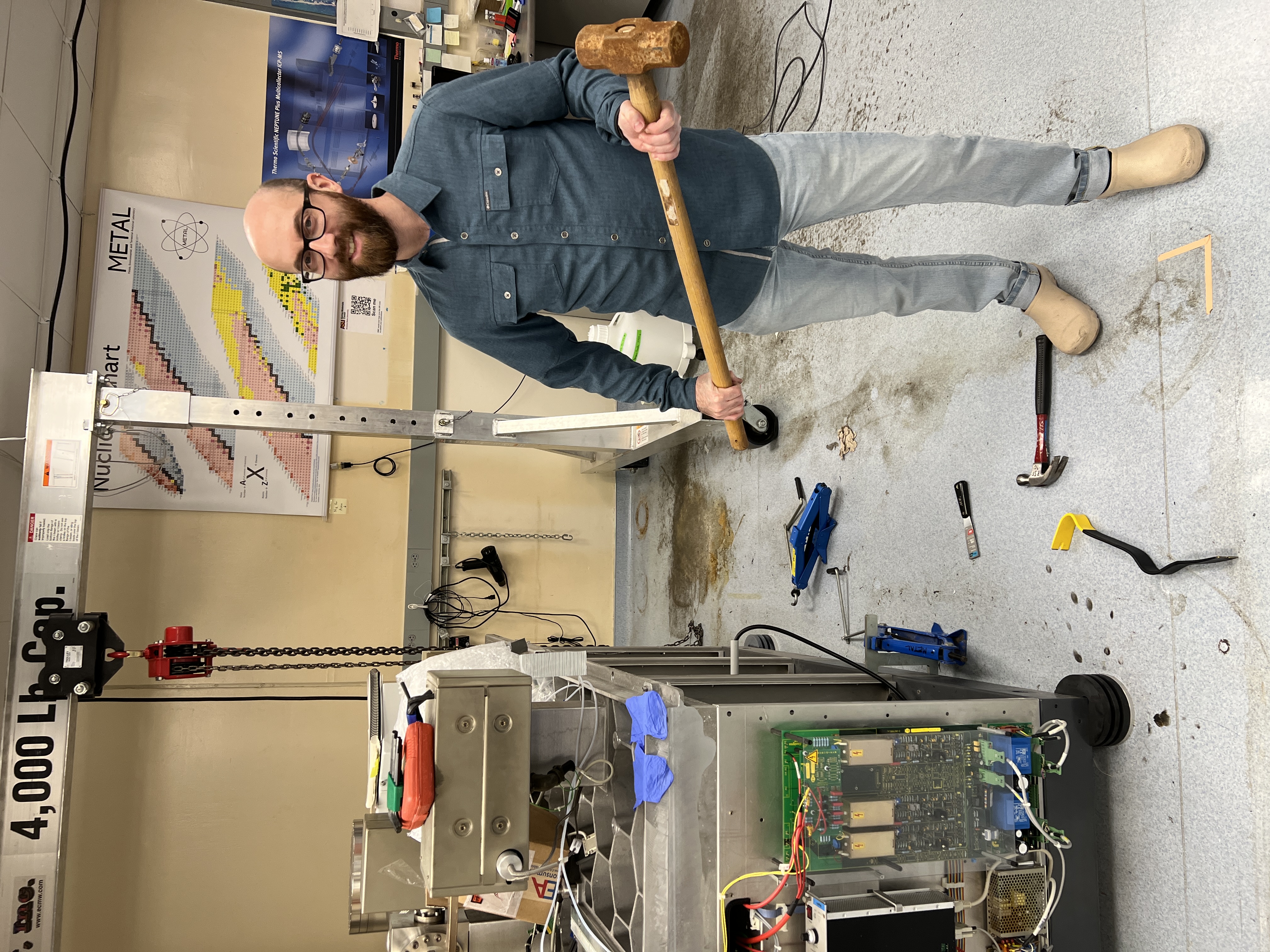 Tyler wields a sledgehammer as he prepares the lab for the new Neoma.
